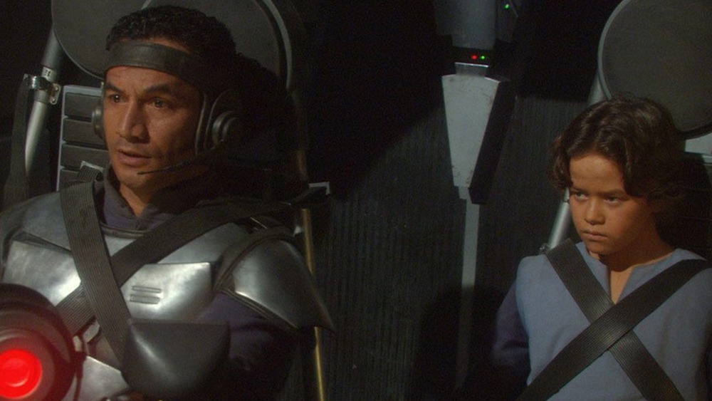 Temuera Morrison as Jango Fett and Daniel Logan as Boba Fett in Star Wars: Episode II - Attack of the Clone