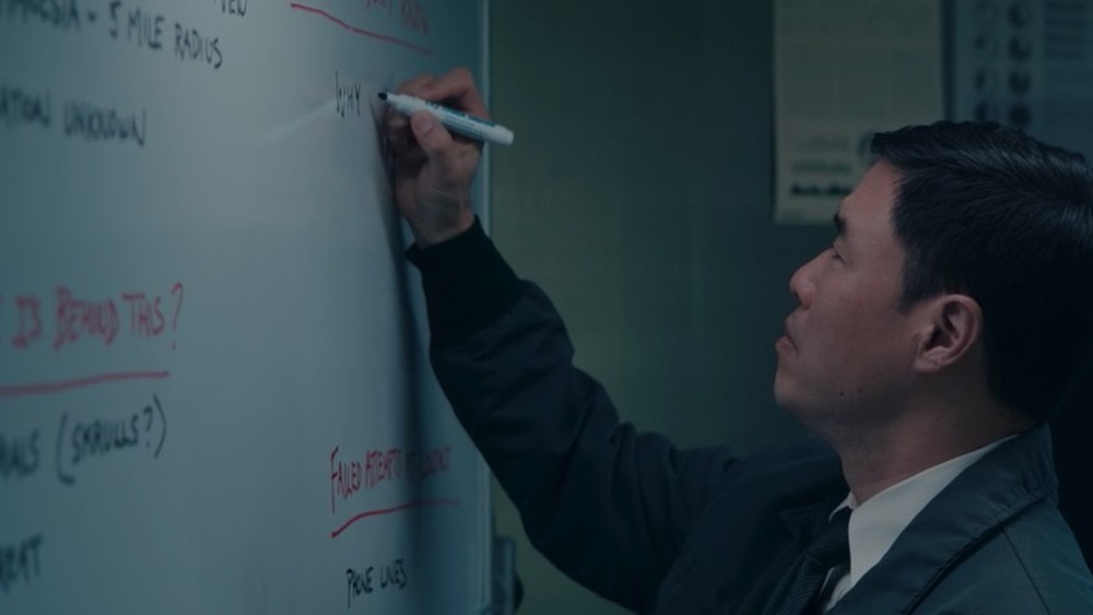Woo on his dry erase board
