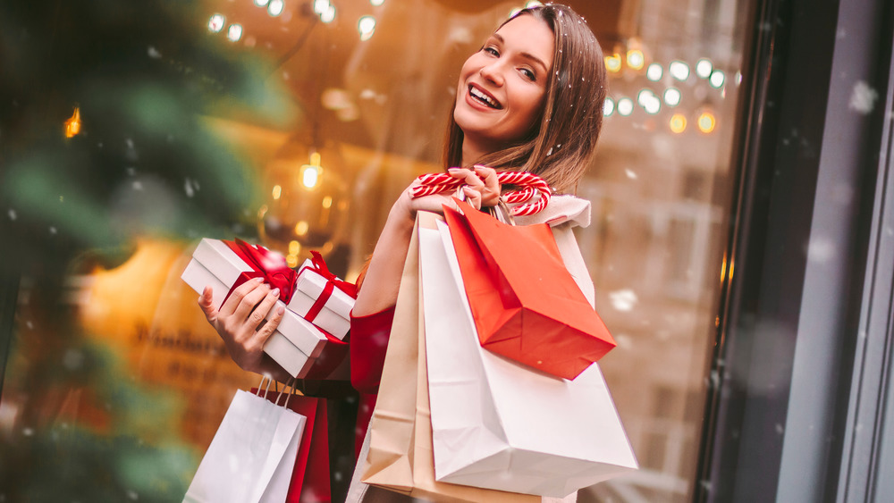 woman with packages and gift bags